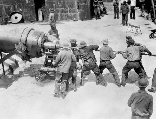 Florida National Guard members loading a cannon - Florida