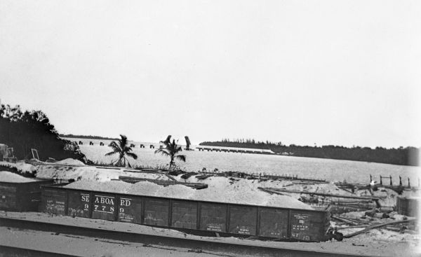 Damaged railroad cars after the 1926 hurricane - Lake Worth, Florida.