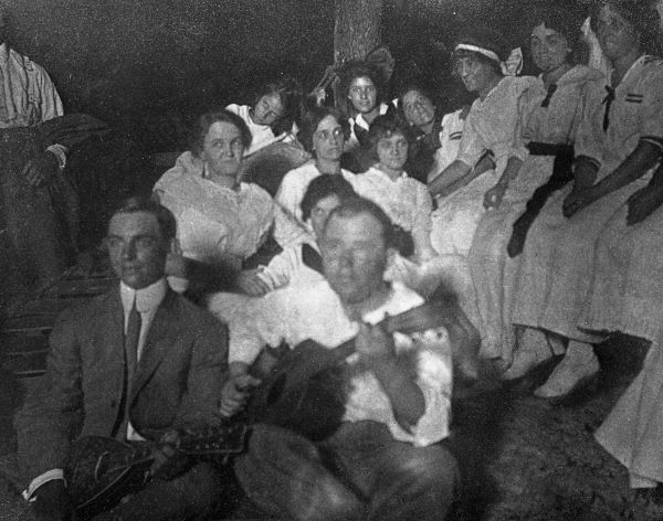 William Edwin Van Brunt playing guitar for an evening sing-along - Lanark Village, Florida