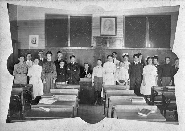 Students posed for photograph inside classroom