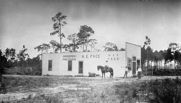 Two men and a horse at the H.E. Page General Store - Narcoossee, Florida