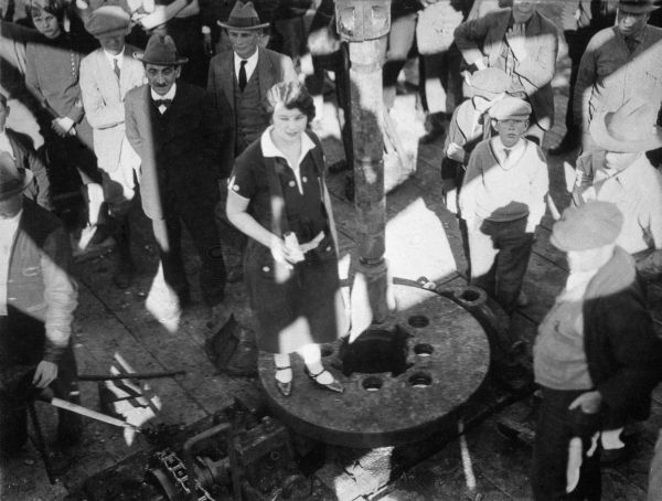 People standing on and around an oil well - Jefferson County, Florida