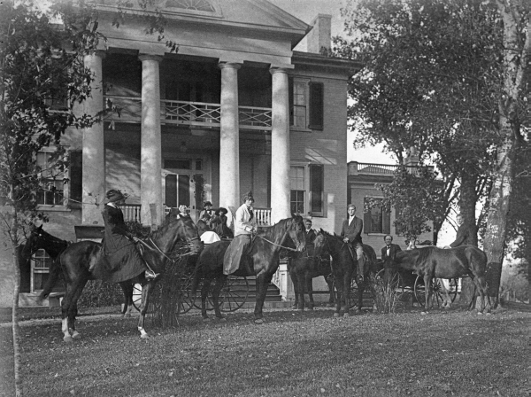 Group on horseback in front of plantation home - Pensacola, Florida.