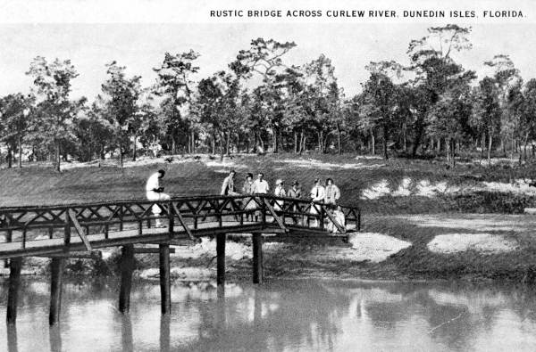 Rustic bridge across Curlew Creek, Dunedin Isles, Florida.