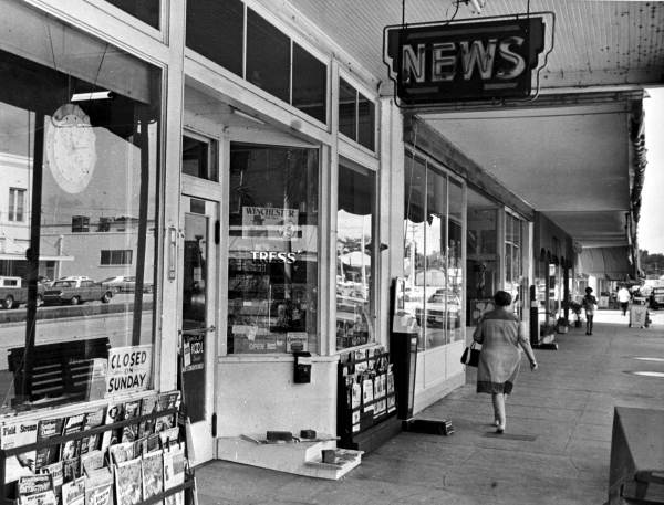 View down sidewalk from Tress's newsstand in Kissimmee.