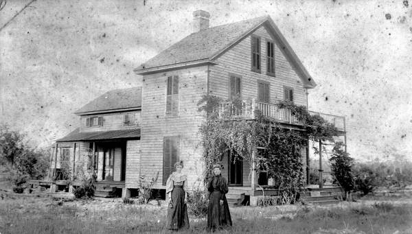 Two women outside the Dr. Henry Benjamin residence - Tampa, Florida.