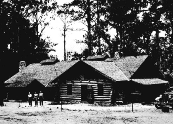 Forestry training camp boys and dignitaries outside the mess hall