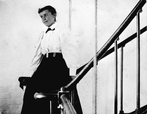 Woman decending the stairs in St. Augustine Lighthouse - St. Augustine, Florida