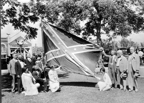 People with flag at United Confederate Veterans reunion in Marianna, Florida.