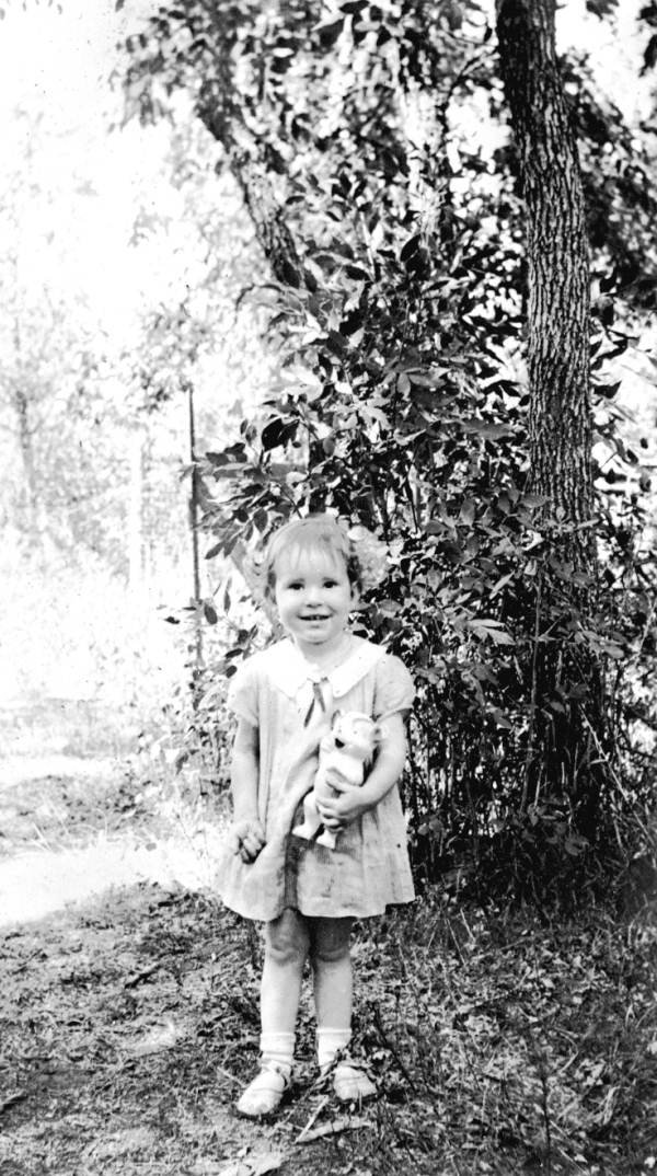Little girl with toy