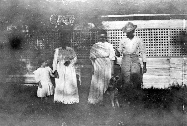 Rollins family with dog at the Kingsley Plantation - Fort George Island, Florida.