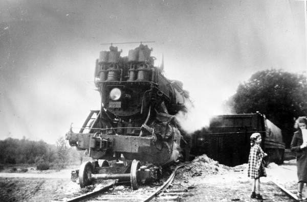 Woman and girl stand near the train wreck - Lloyd, Florida.