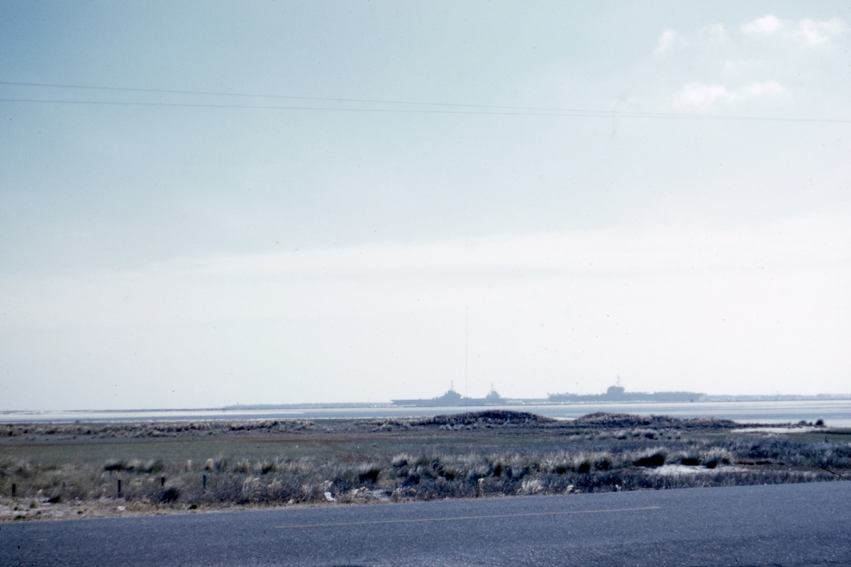 Aircraft carriers in the distance - Mayport, Florida .