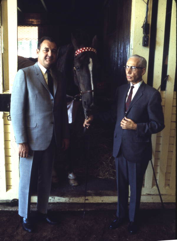 Portrait of Governor Claude Kirk, left, at a horse farm