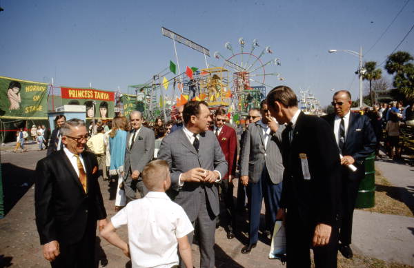 View showing Governor Claude Kirk at a carnival
