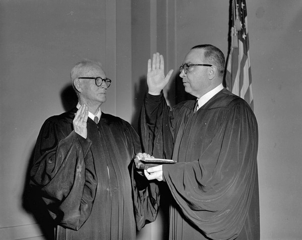 Swearing in Chief Justice John Mathews Sr. by Justice B. K. Roberts.