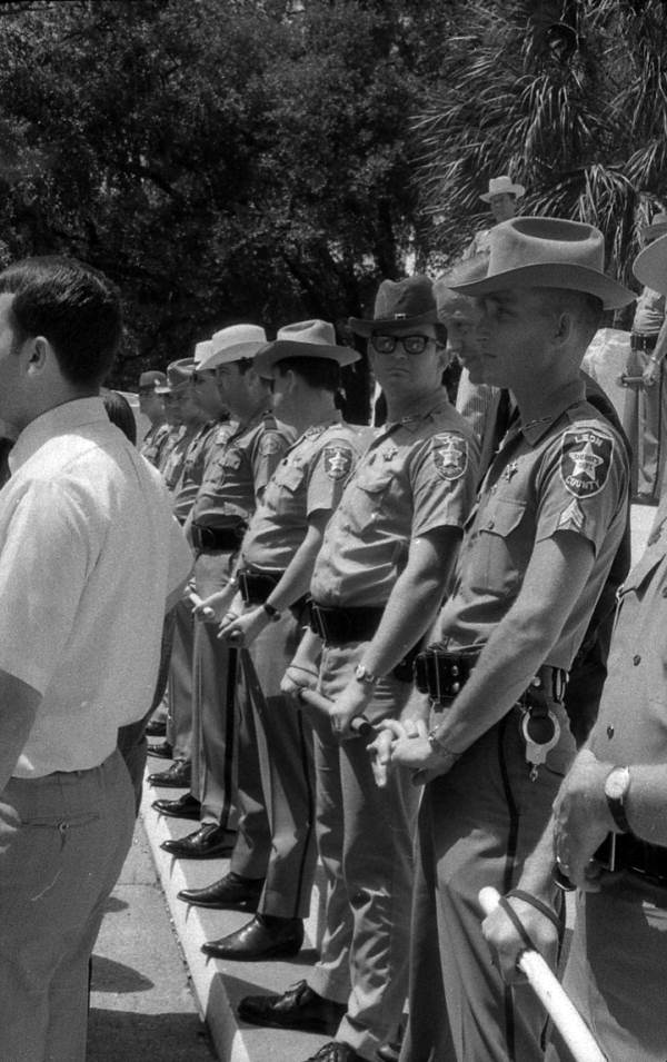 Close-up view showing officers from the Leon County Sheriff's Department on the steps of the Capitol during the Free Sandford rally by FSU students - Tallahassee, Florida.