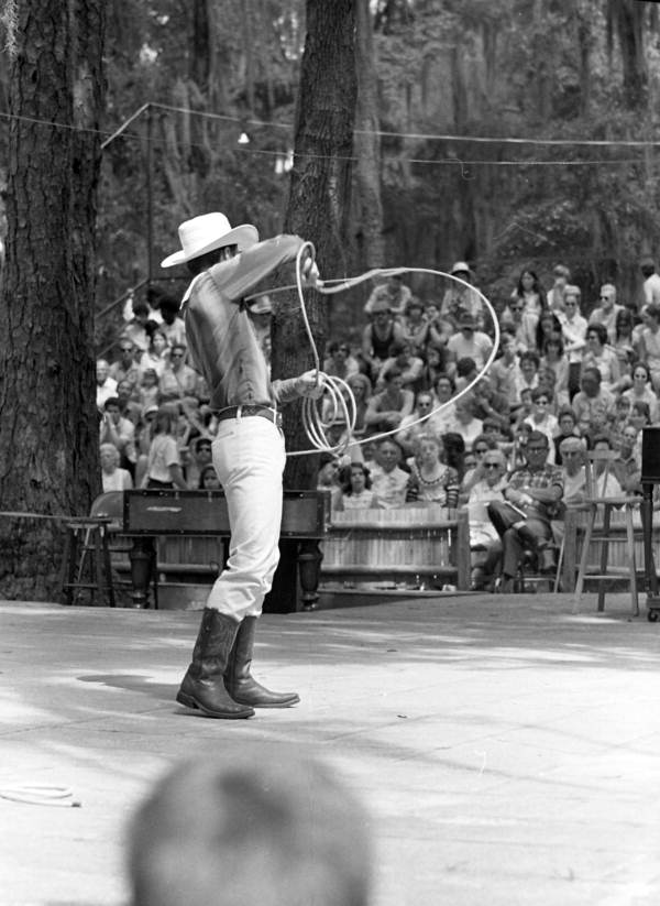 View of trick roper Danny Coflin performing at the 1970 Florida Folk Festival - White Springs, Florida.