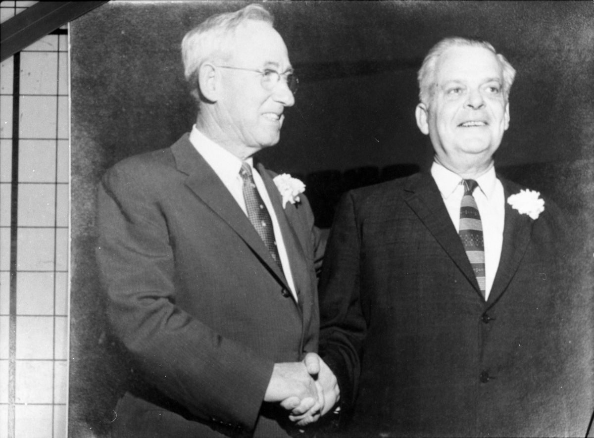 Bill Shands and W.T. Davis shaking hands - Madison County, Florida