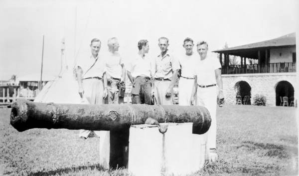 Treasure hunter Art McKee assembled with men for group portrait
