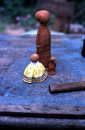 Various sized Seminole dolls in the process of being made by Mary Billie: Big Cypress Seminole Indian Reservation, Florida