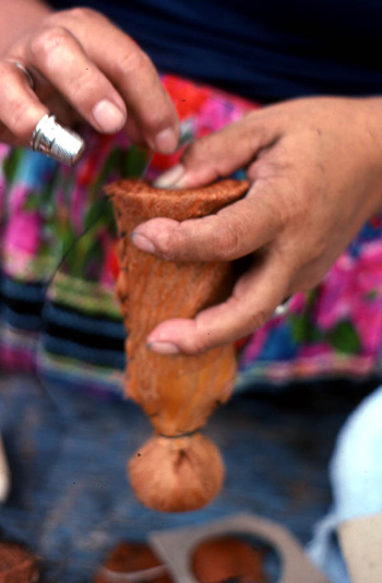 Seminole woman starting to make dolls: Big Cypress Seminole Indian Reservation