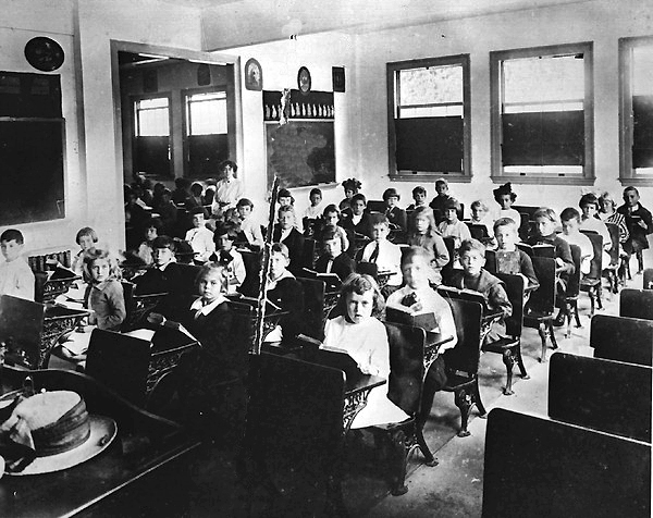 School children at their desks.