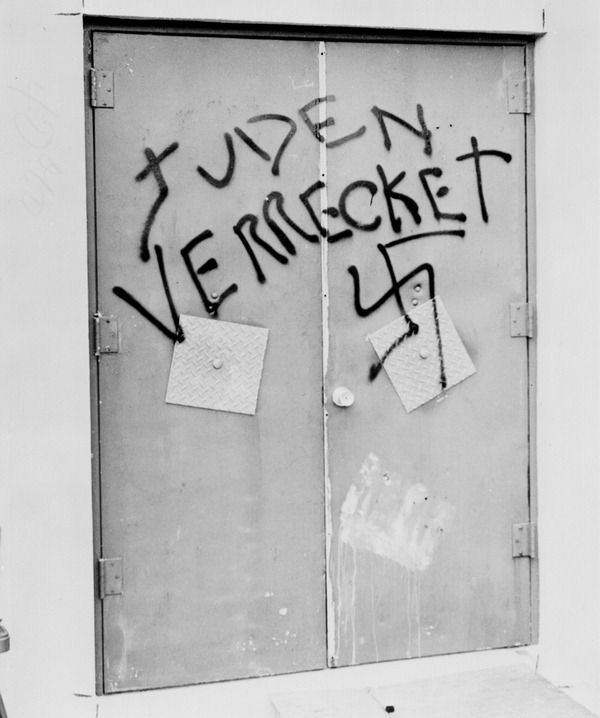 Racial epithet and swastikas spray painted on door at Hebrew day school