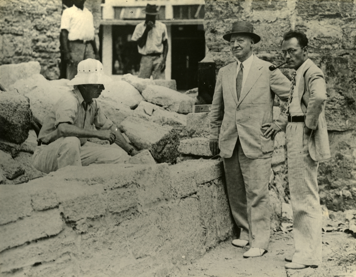 Men inspecting restoration work at the City Gates in St. Augustine, Florida.