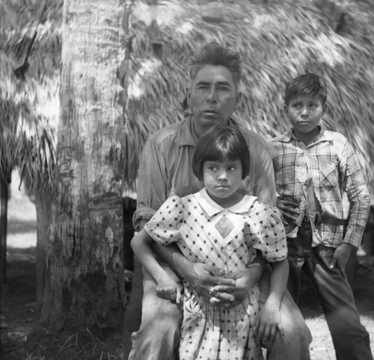 Seminole Indian Frank Shore with his daughter Molly and his son