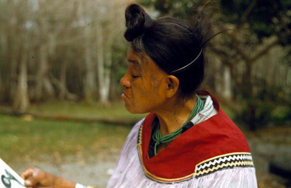Lucy Tiger Billie reading at the Big Cypress Seminole Indian Reservation.