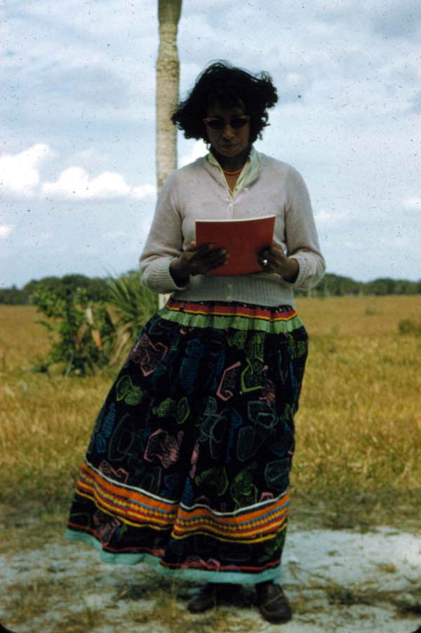 Unidentified Seminole Indian woman reading