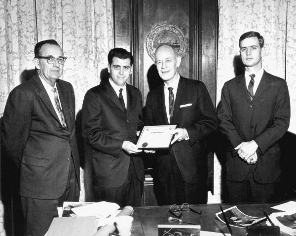 Florida Governor Farris Bryant receiving a certificate.