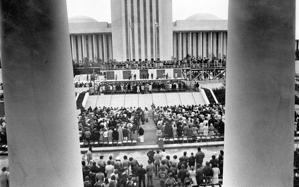Inauguration day crowd framed by the columns of the Supreme Court building.