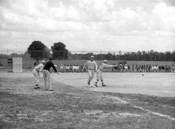 Raiford prison inmates watching a baseball game