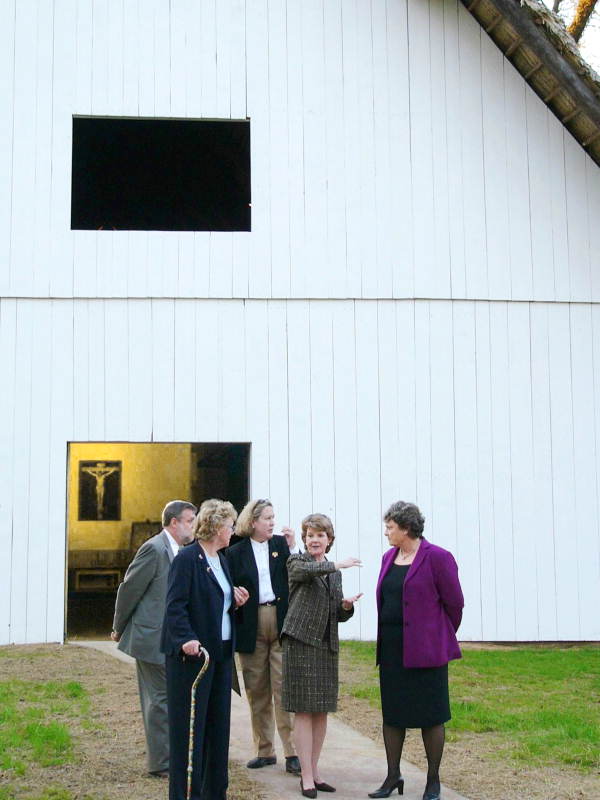 Secretary of State Glenda Hood talking to House Tourism Committee chairperson Nancy Detert by historic San Luis Mission building - Tallahassee, Florida.