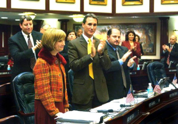 Florida Representatives applauding after the passage of a medical reform bill - Tallahassee, Florida.