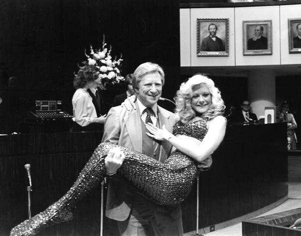Senator Dempsey Barron with a Weeki Wachee Springs waterpark mermaid during the 1982 Legislative Session - Tallahassee, Florida.