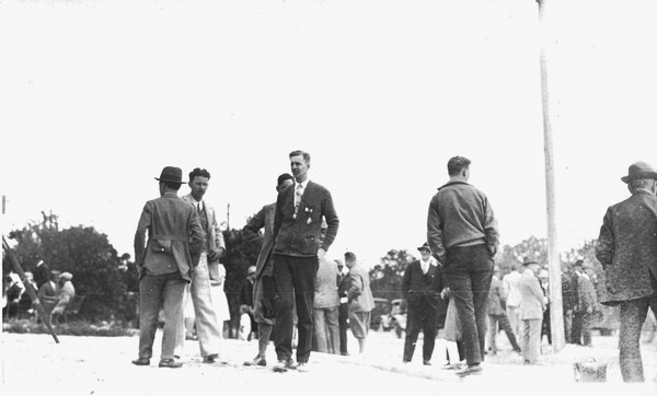 Group of men standing around