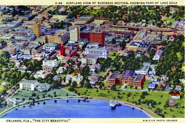 Aerial view of business section, showing part of Lake Eola.