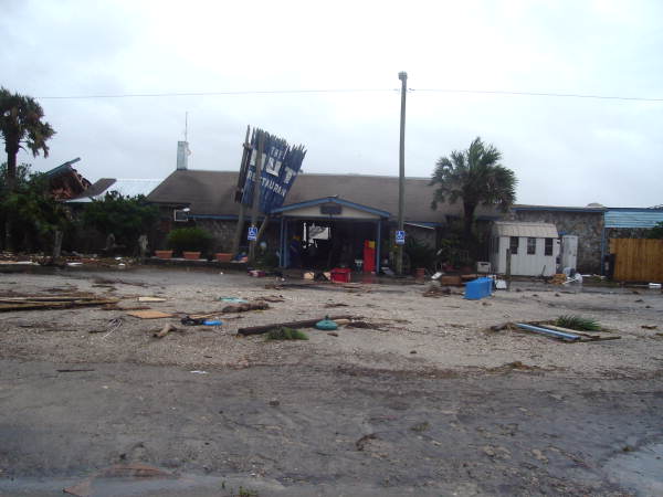 View showing The Hut Restaurant at W. Hwy 98 damaged by Hurricane Dennis - Apalachicola, Florida.