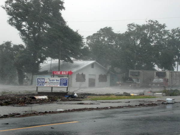 View showing flood waters from Hurricane Dennis around building in Apalachicola, Florida.
