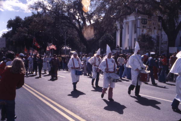 KKK members marching north on South Monroe Street during a rally in Tallahassee, Florida.