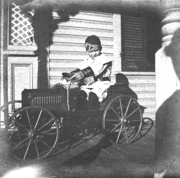 Boy with miniature car