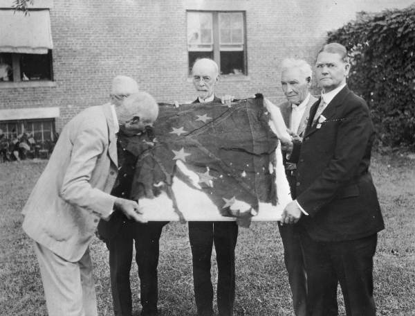 Return of a Confederate army unit battle-flag, at a United Confederate Veterans' reunion in Marianna, Florida.