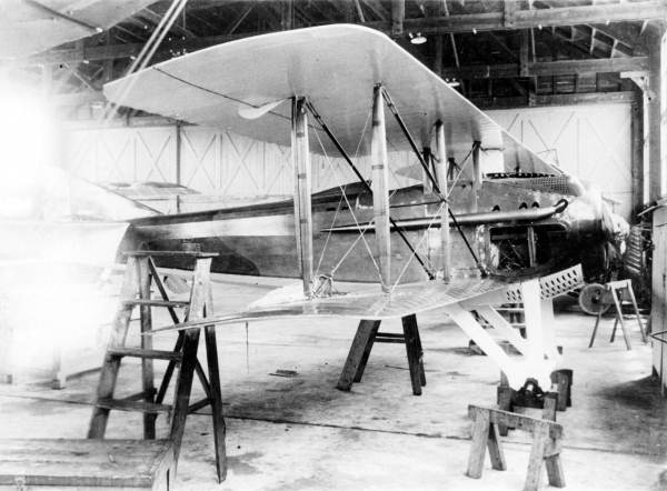 Airplane in hangar at Carlstrom Field.