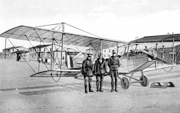 Three men with airplane near Arcadia - De Soto County, Florida.