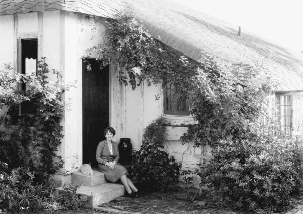 Marjory Stoneman Douglas on the steps of her home.