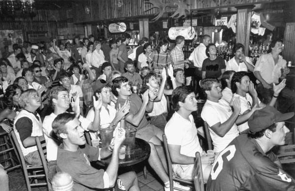 NCAA World Series baseball fans at Bullwinkles bar.