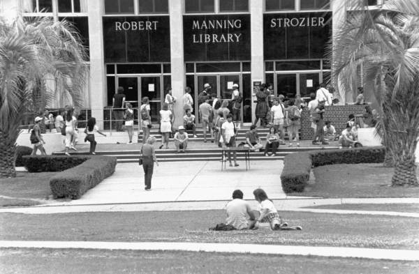 Students wait for the library to open to study for finals.